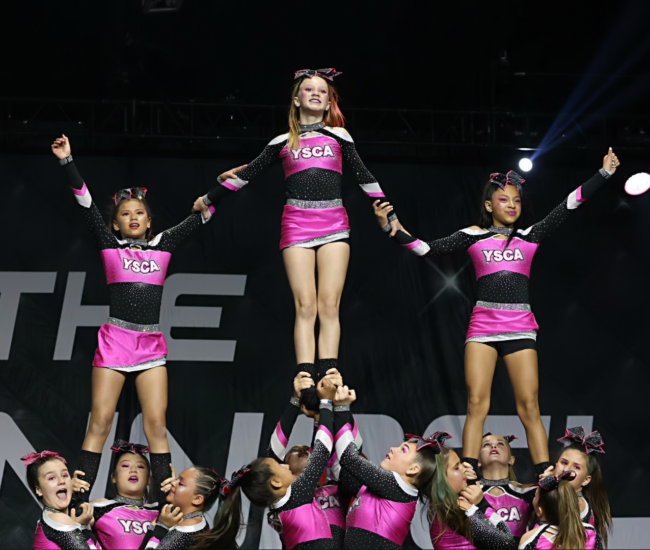Yuba Sutter Cheer Athletics Cheerleading Yuba Sutter Cheer Athletics competitive cheer team performing a stunt pyramid