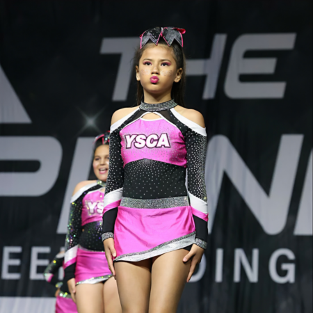 Yuba Sutter Cheer Athletics Elite Team Yuba Sutter Cheer Athletics Elite Team athlete performing at a cheer competition